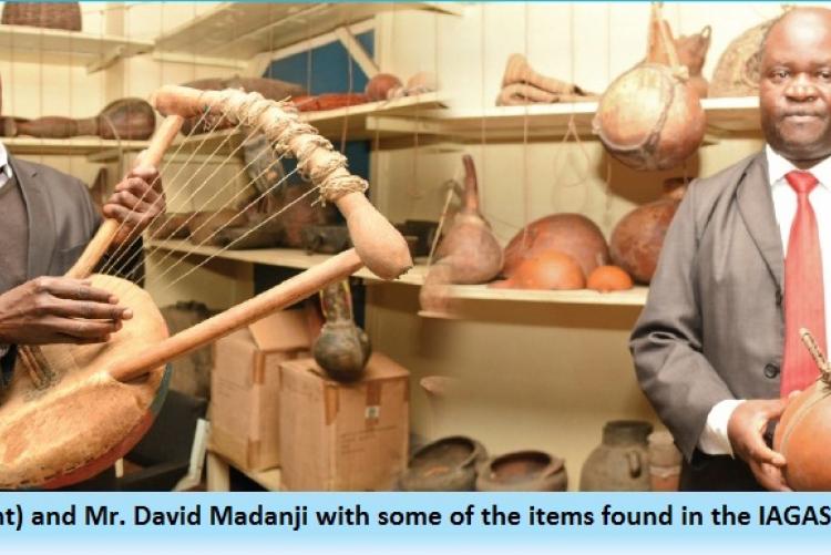 Prof. Wilfred Subbo (R) and Mr. David Madanji with some of the items found in the material culture section