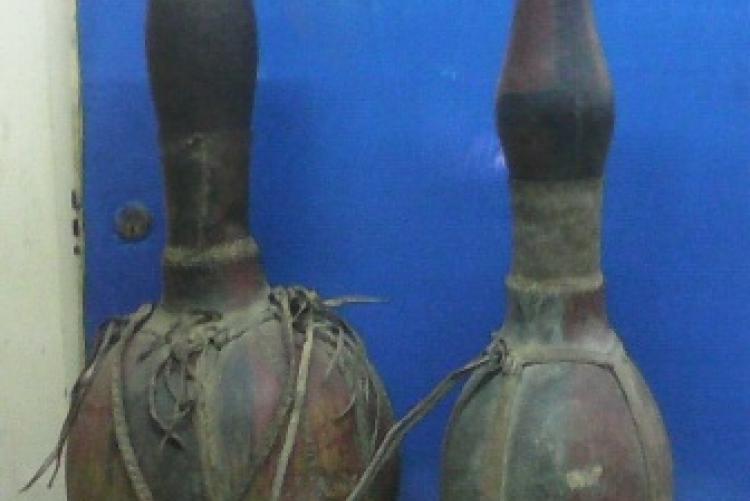 Turkana milk gourds hollowed from blocks of wood